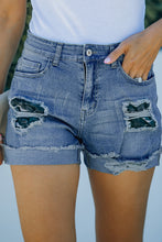 Load image into Gallery viewer, Camo Patchwork Rolled Hem Denim Shorts

